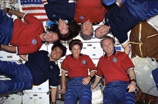 STS-91 crew inflight portrait taken in the middeck. 